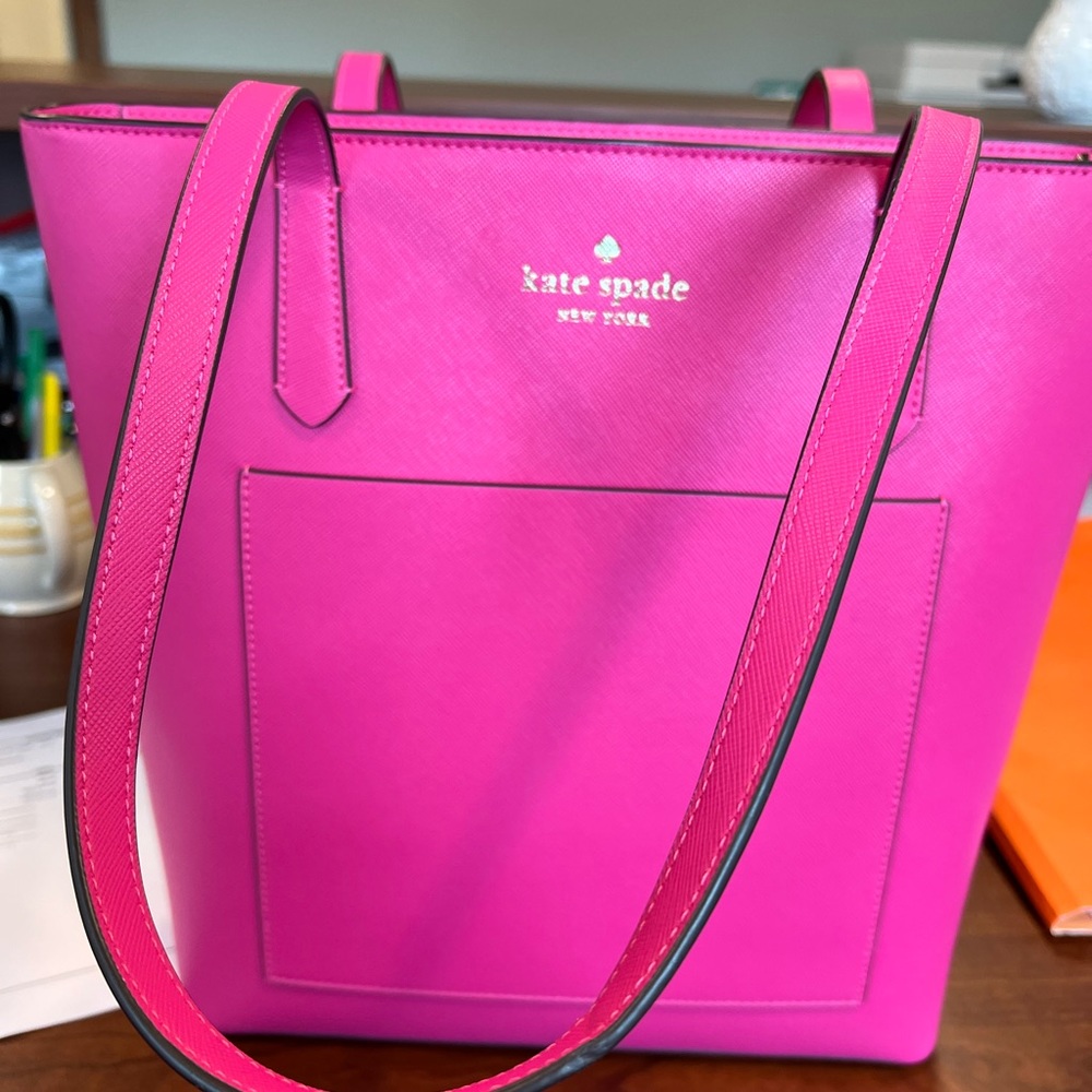 Kate Spades Surprise hot pink tote